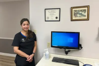 jing-dental-hygienist female dental hygienist in dark blue uniform