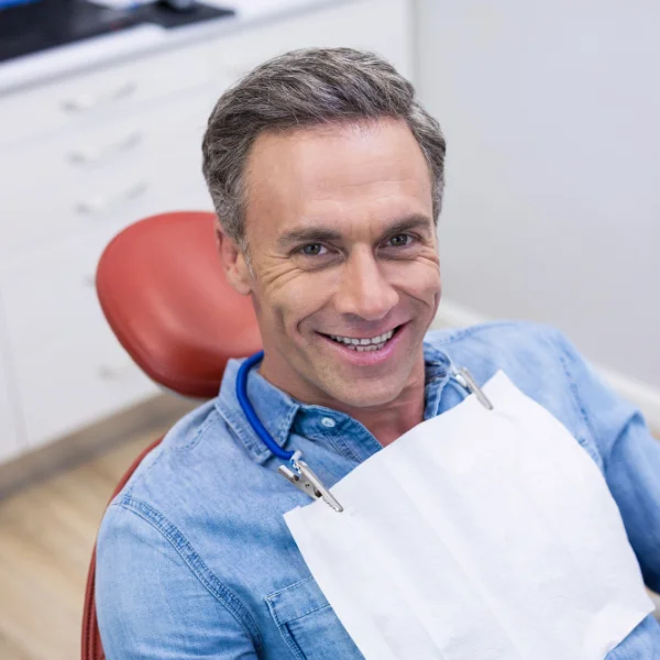 middle aged man in dentist chair