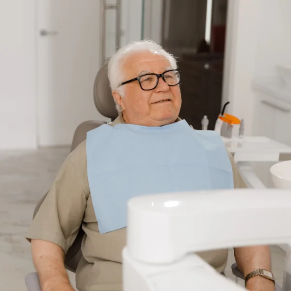 senior man in dental chair
