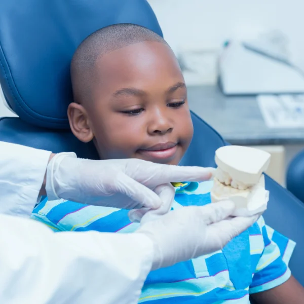 young boy in dentist chair